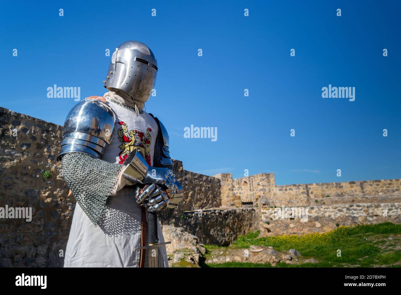 Closeup of a knight in a medieval armor with sword in hand Stock Photo ...