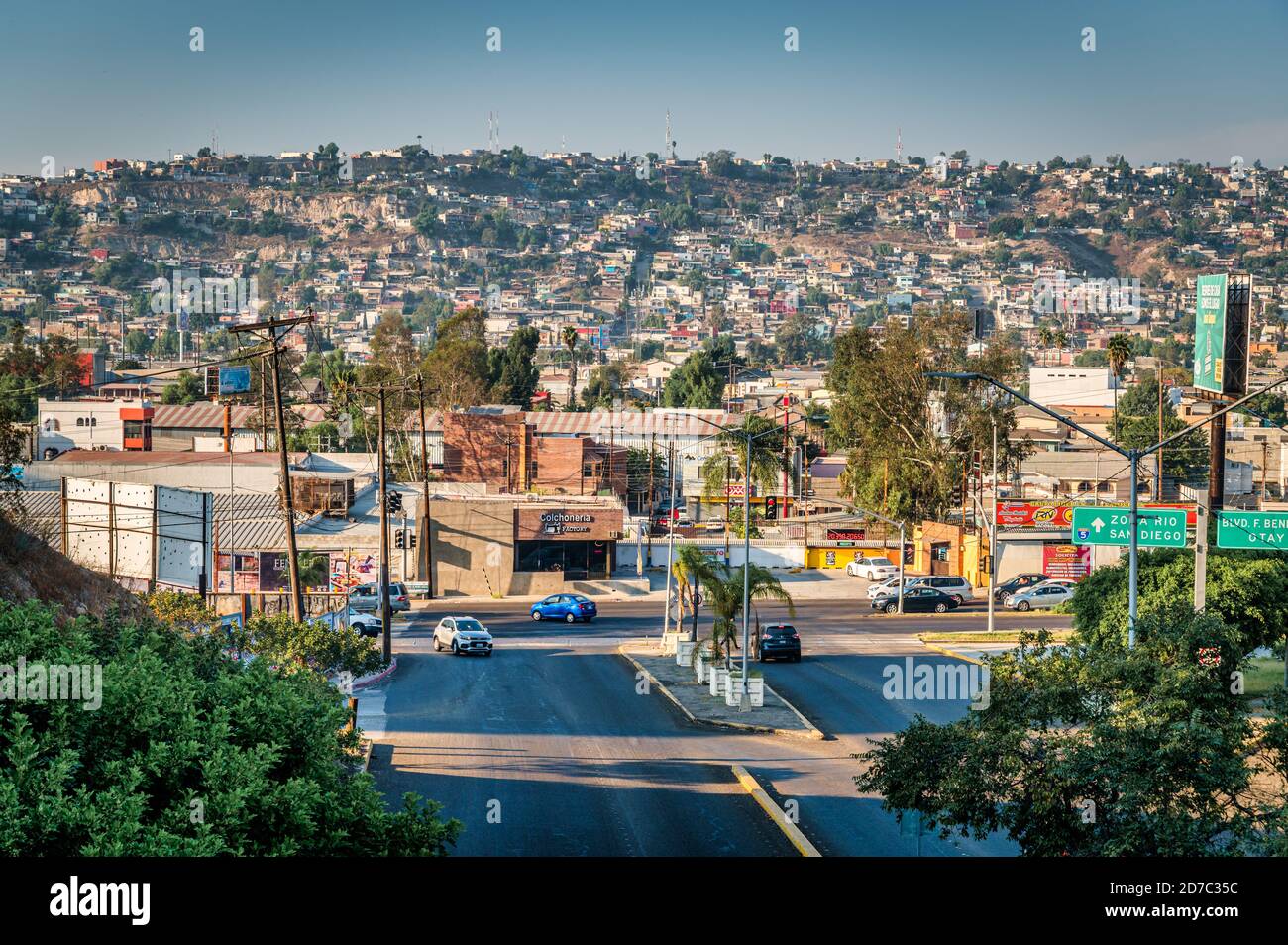 View of poor area of Tijuana Mexico with buildings on hill.  Stock Photo
