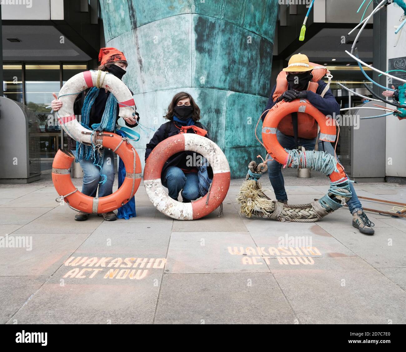 Ocean Rebellion activists protest in London to raise awareness of the Wakashio oil disaster and the use of fossil fuels in the shipping industry. Stock Photo