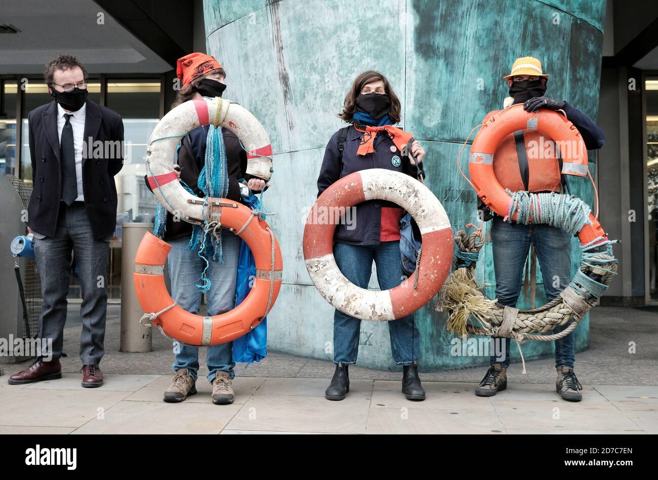 Ocean Rebellion activists protest in London to raise awareness of the Wakashio oil disaster and the use of fossil fuels in the shipping industry. Stock Photo