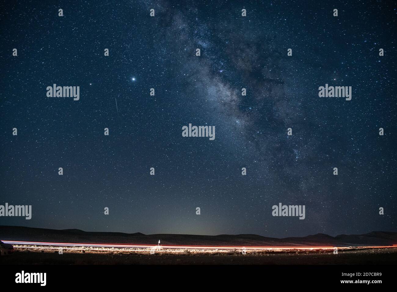 Landscape of Negev under a breathtaking starry sky at night in Israel