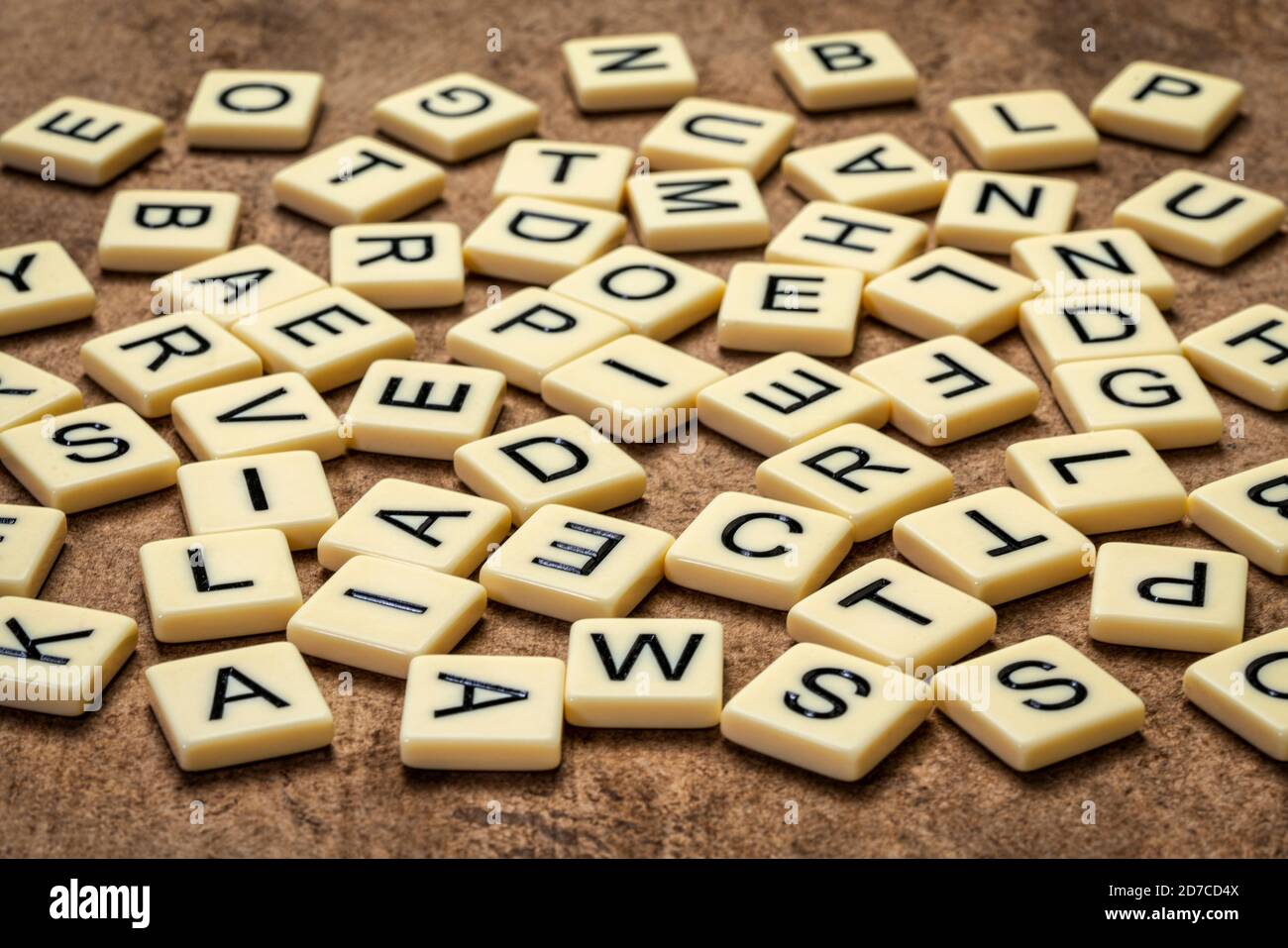 alphabet in random letter tiles on a handmade background, typography concept Stock Photo