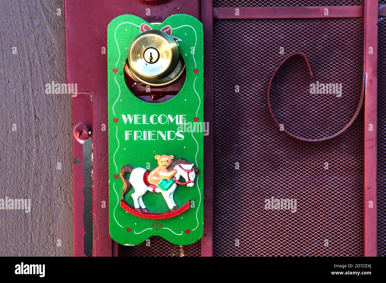 Greeting friends at the door hi-res stock photography and images - Alamy