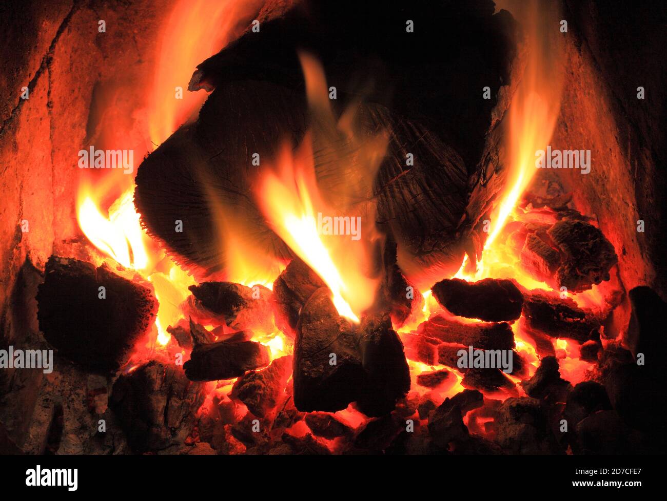 Coal and wood log, fire, domestic, hearth, burning, heat, warmth Stock Photo