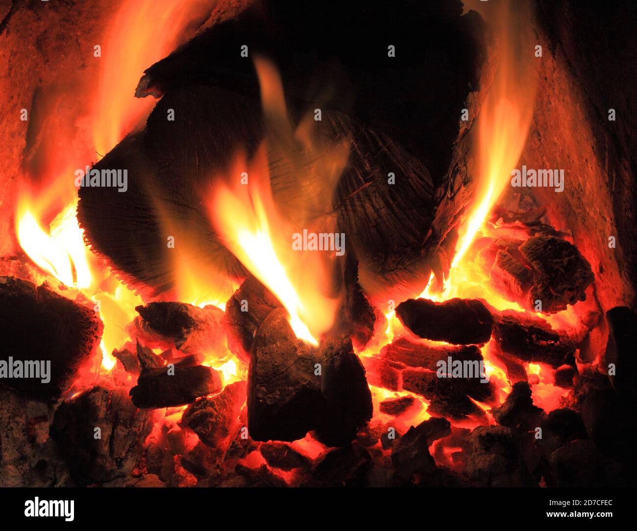 Coal and wood log, fire, domestic, hearth, burning, heat, warmth Stock Photo