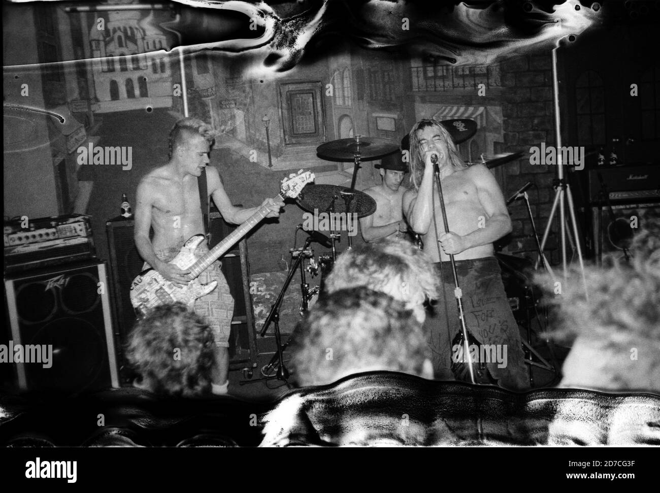 Flea (Peter Michael Balzary, left) and Anthony Kiedis of  Red Hot Chili Peppers performing at the Red Creek Inn, Rochester, NY, USA on November 10th, 1985 - Photo has technical imperfections! Stock Photo