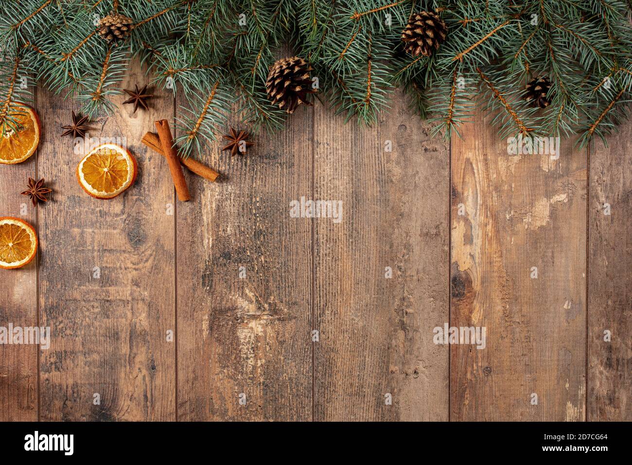 Christmas holiday border with evergreen branches on rustic cedar wooden  boards Stock Photo - Alamy