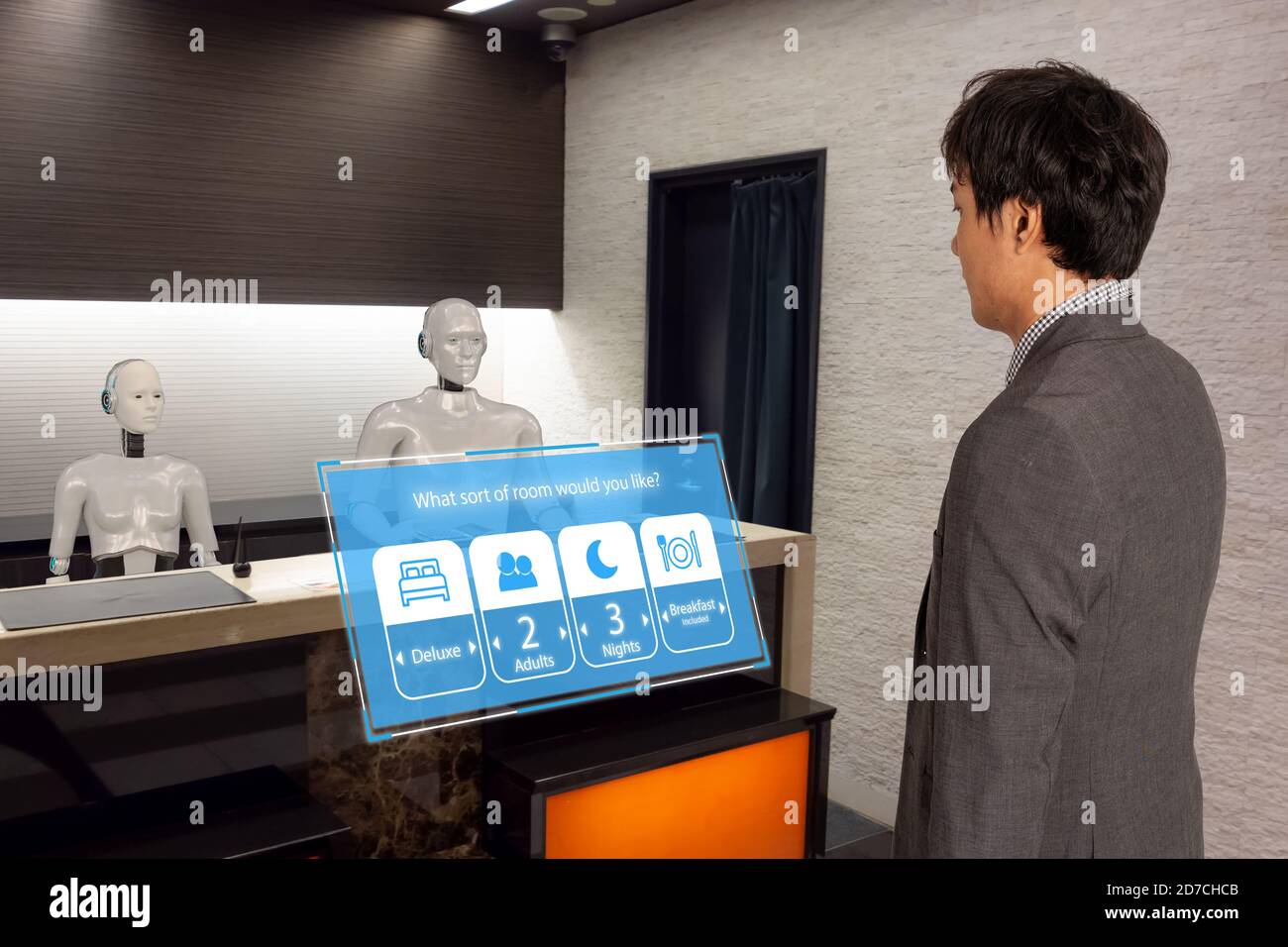 smart hotel in hospitality industry 4.0  concept, the receptionist robot (robot assistant ) in lobby of hotel or airports always welcome customer the Stock Photo