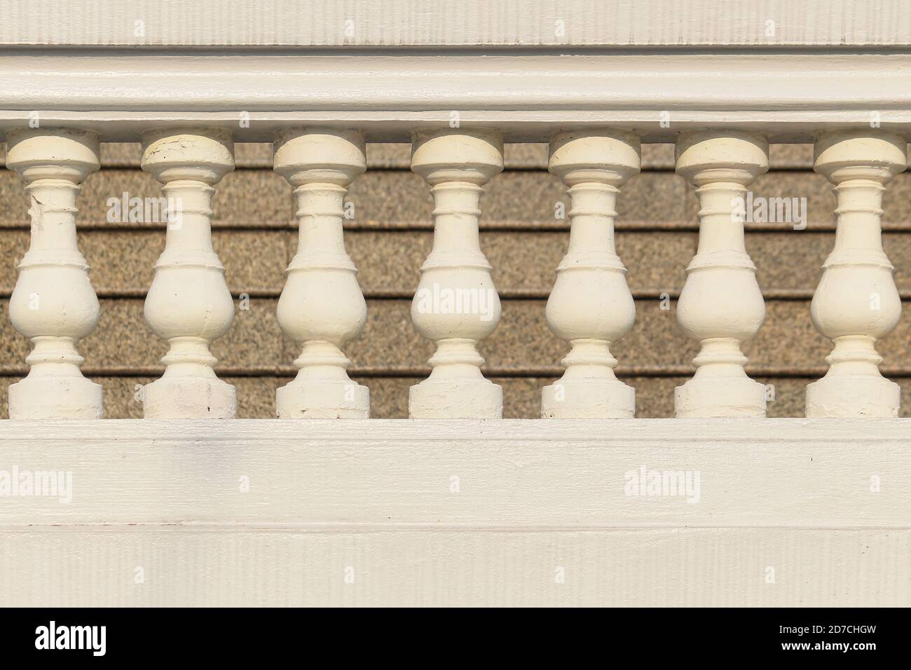 White stucco balustrade, marble staircase that is out of focus. Stock Photo