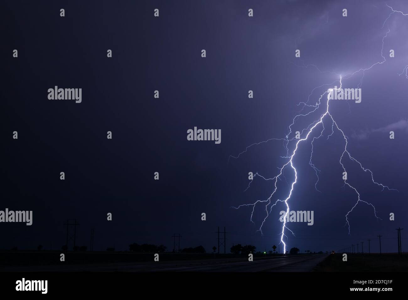 Lightning bolt storm and thunder clouds night sky near Kim, Colorado Stock Photo