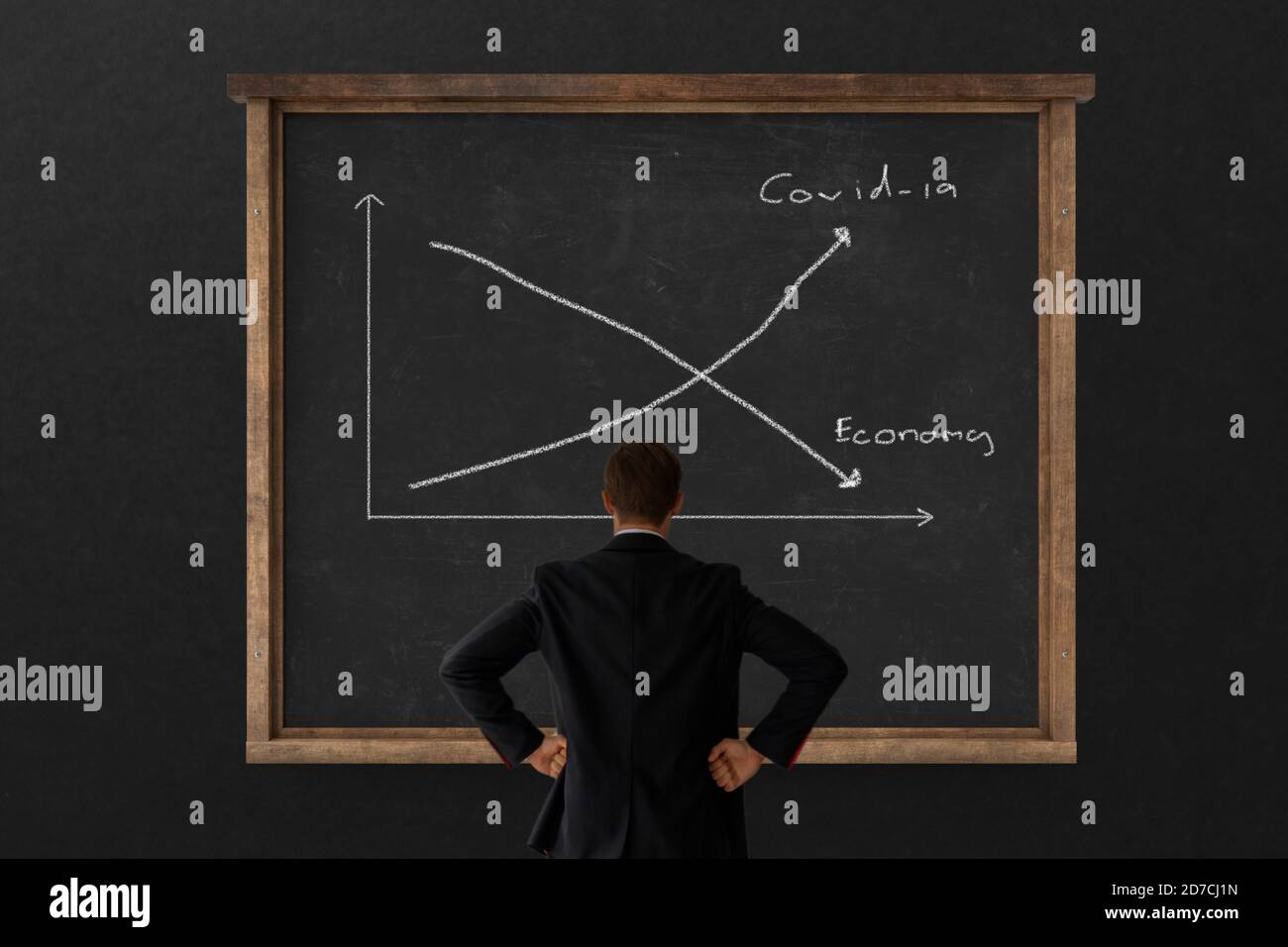 Business growth concept. business man looking to the graph with growth rate down while corona virus covid-19 spread. business economy crisis fall down Stock Photo