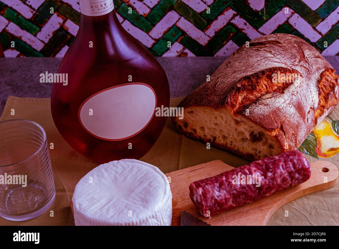 Goat cheese with wine bread and salami Stock Photo Alamy
