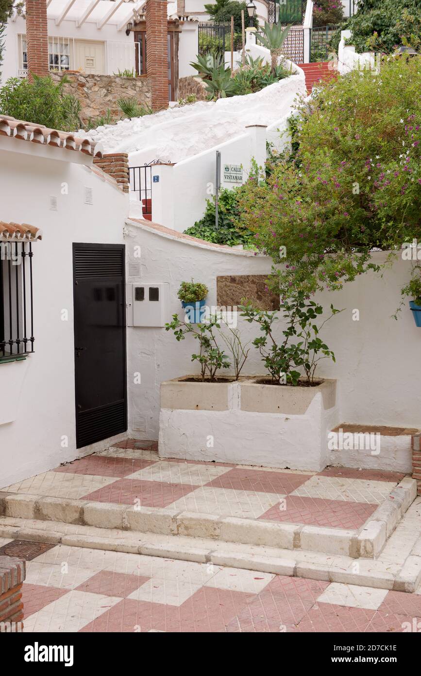 White walled garden and tiles Stock Photo Alamy