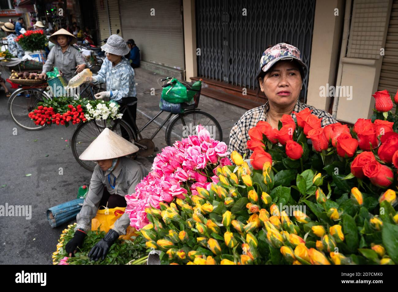 Portrait of a flower vendor, Hanoi, Vietnam Stock Photo