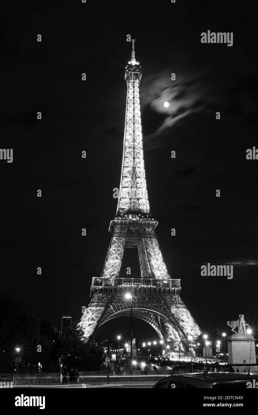 Eiffel Tower at night with moon Stock Photo Alamy