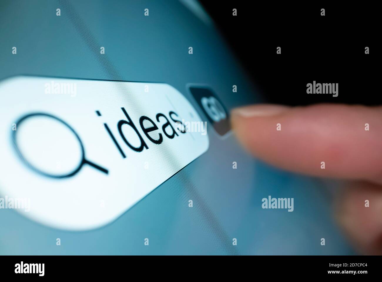 Searching for ideas on the Internet Stock Photo