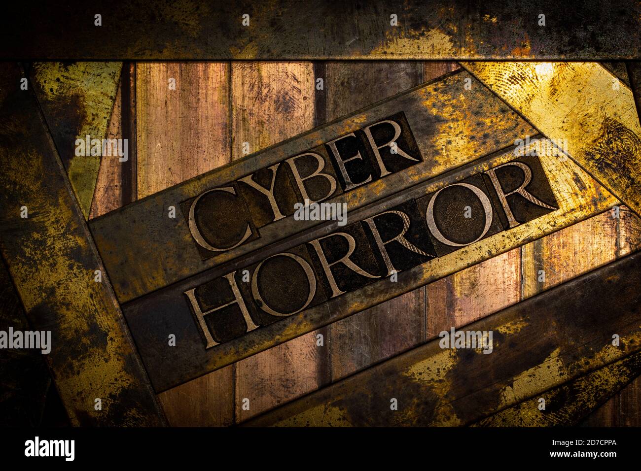 Cyber Horror text message on vintage textured grunge copper and gold background Stock Photo