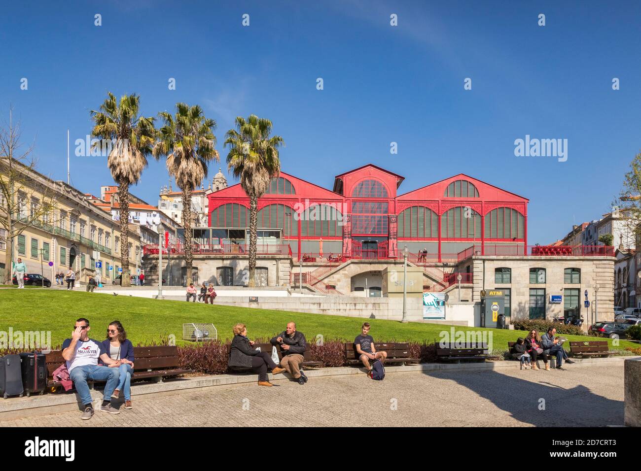 10 March 2020: Porto, Portugal - People sitting in the Praca Infante Dom Henrique or Prince Henry the Navigator Place in Porto. Stock Photo