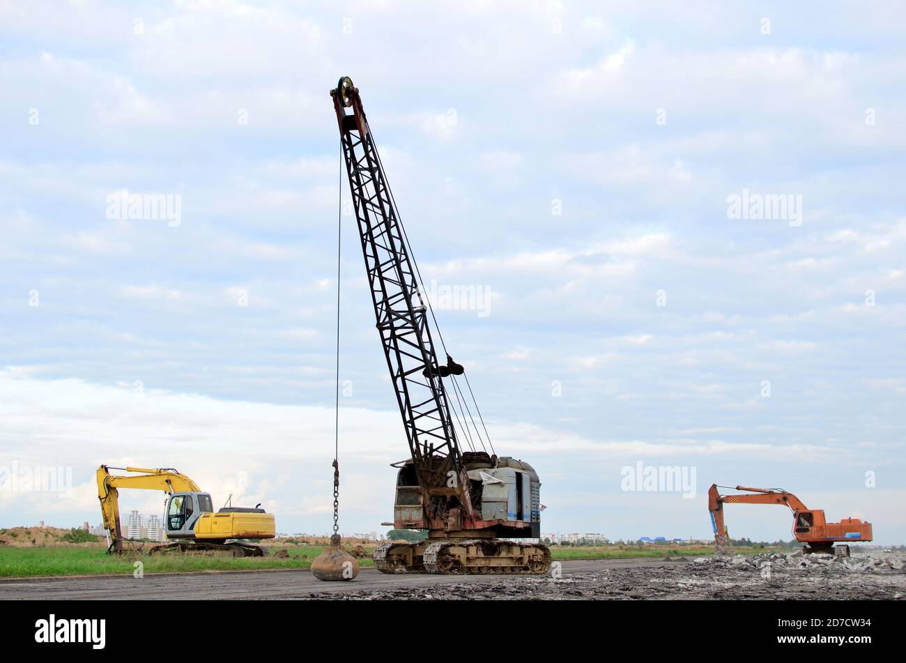 Large crawler crane or dragline excavator with a heavy metal wrecking ball  on a steel cable. Wrecking balls at construction sites. Dismantling and dem  Stock Photo - Alamy