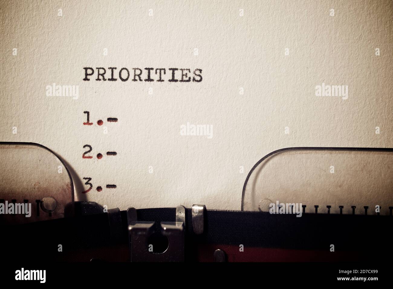 Priorities word written with a typewriter Stock Photo - Alamy