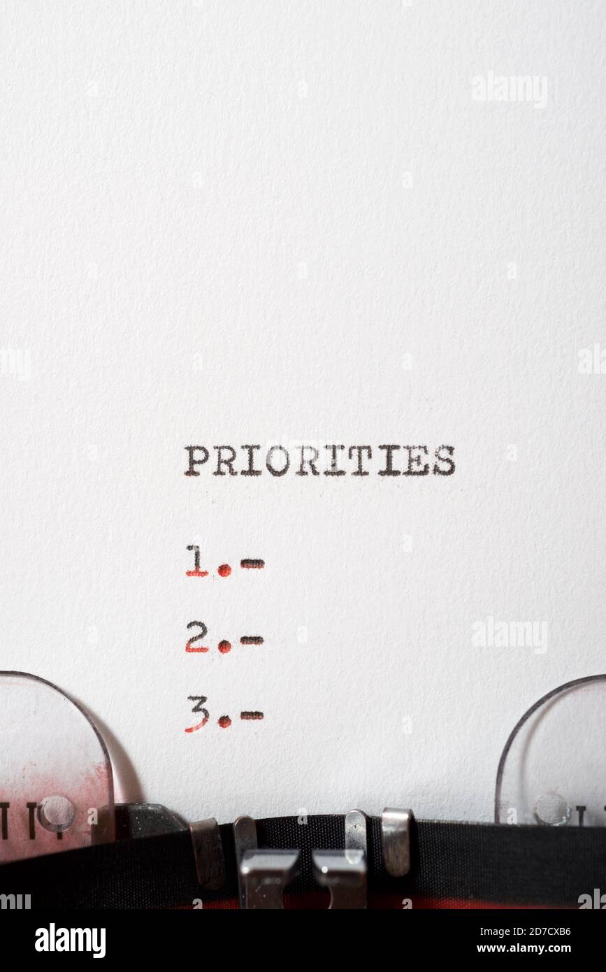 Priorities word written with a typewriter Stock Photo - Alamy