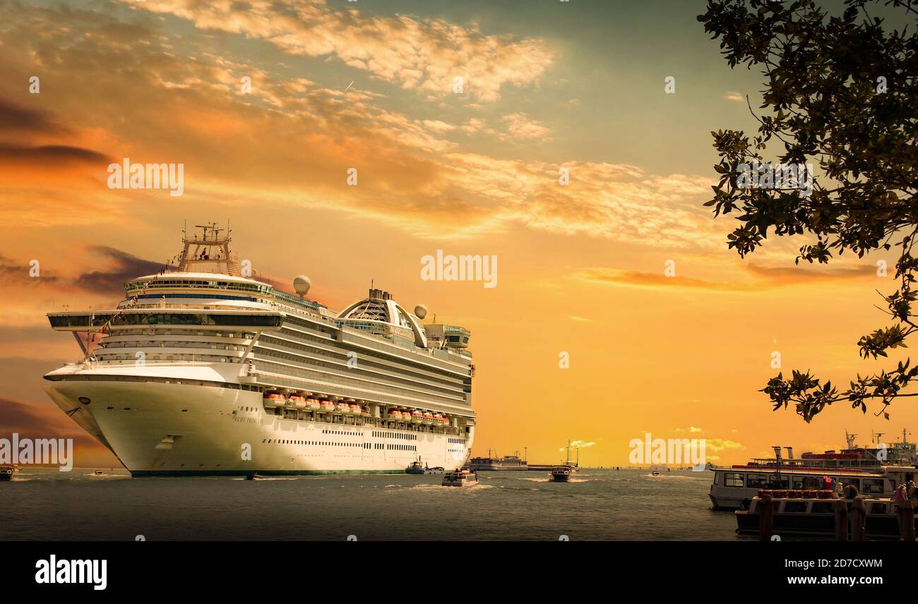 Cruise ship docked at port on sunset. Sunset over a sea Stock Photo - Alamy