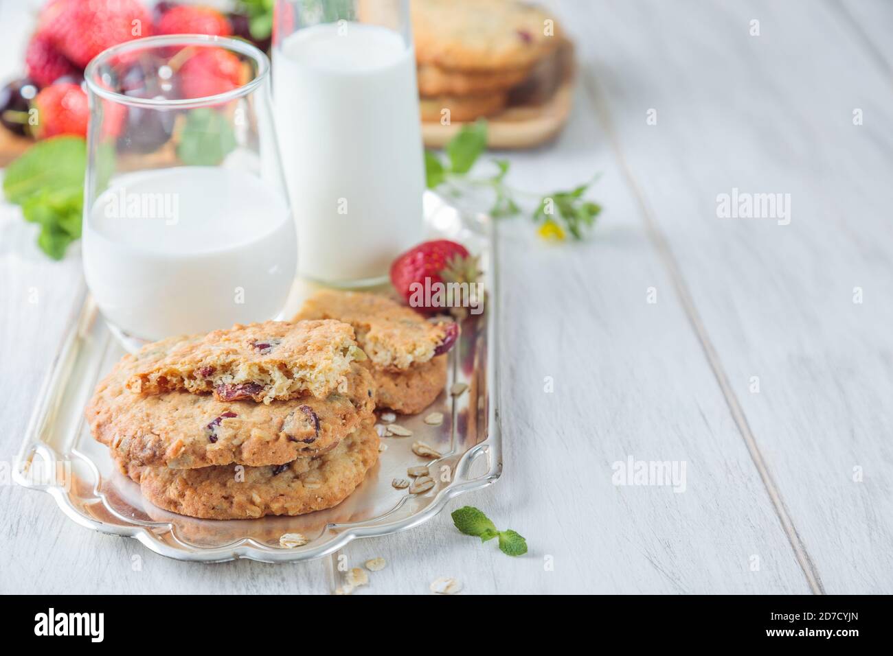Breakfast with orange juice and oatmeal cookies Stock Photo
