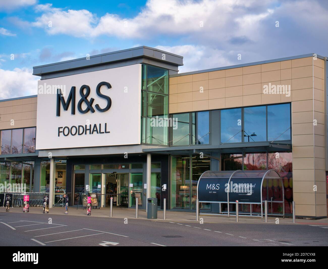 The frontage and barnd logo of a Marks & Spencer Foodhall, taken in a local retail park on Wirral, UK on a sunny afternoon Stock Photo