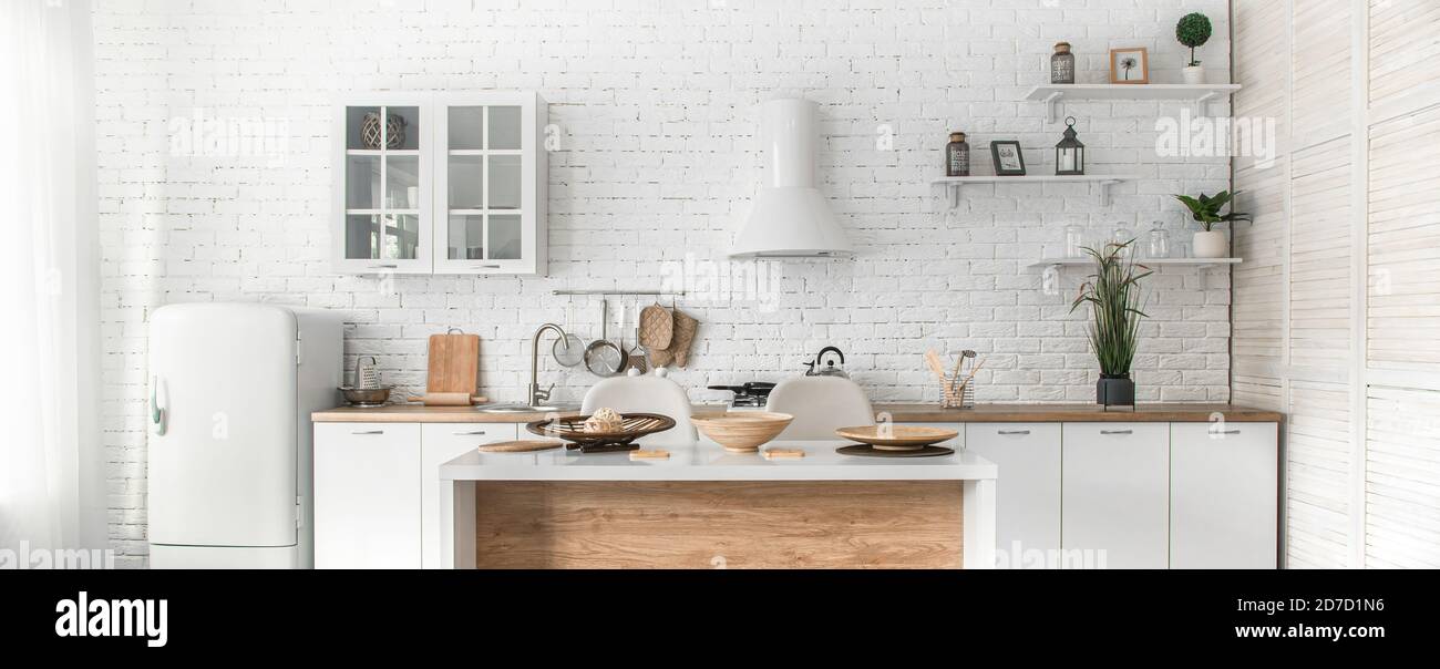 https://c8.alamy.com/comp/2D7D1N6/modern-stylish-scandinavian-kitchen-interior-with-kitchen-accessories-bright-white-kitchen-with-household-items-2D7D1N6.jpg