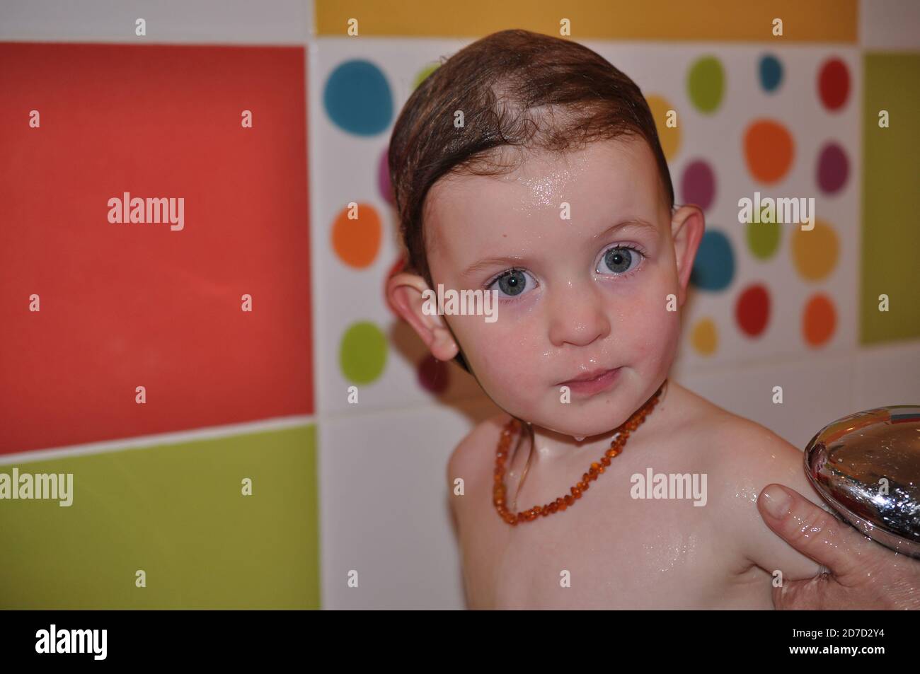 Little girl in the shower with necklace Stock Photo Alamy