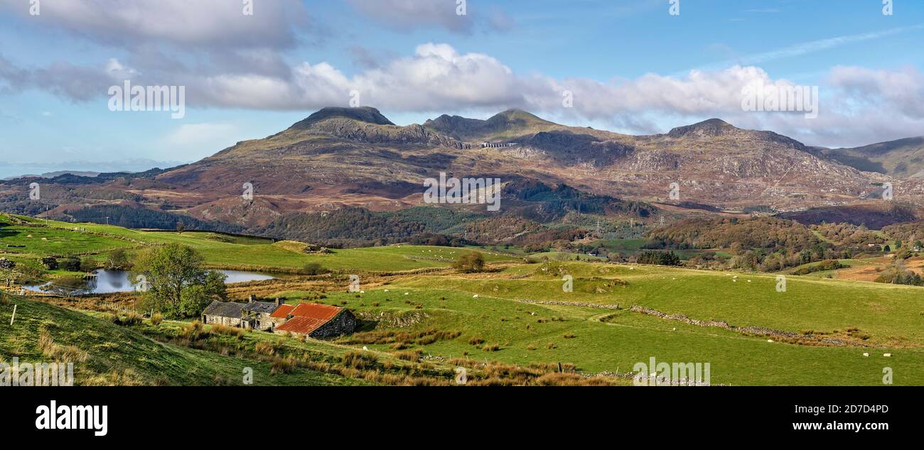 Moelwyn Mountains looking west from near Llan Festiniog with Moelwyn Bach on the left and Moelwyn Mawr in the center North Wales UK October 2019 3083 Stock Photo