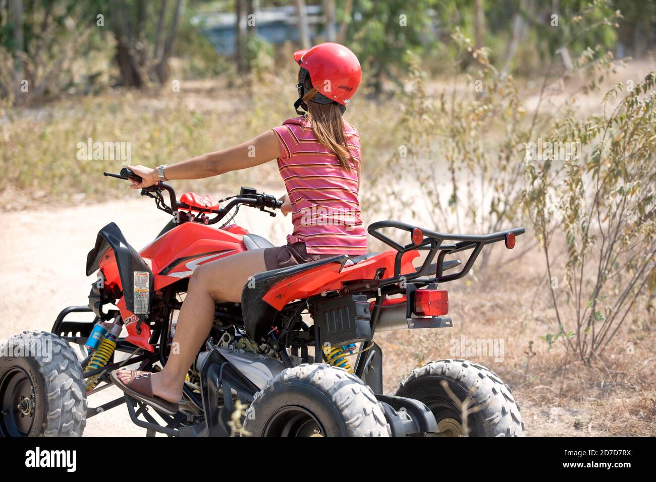 Woman ATV quad bike female rider. Thailand S. E. Asia Stock Photo - Alamy