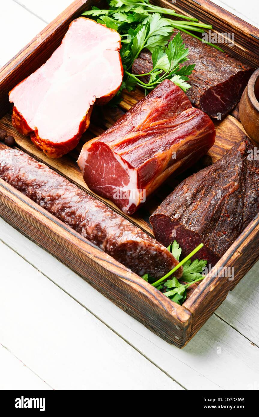 Italian meat platter.Cured meat and sausages.Smoked meat Stock Photo