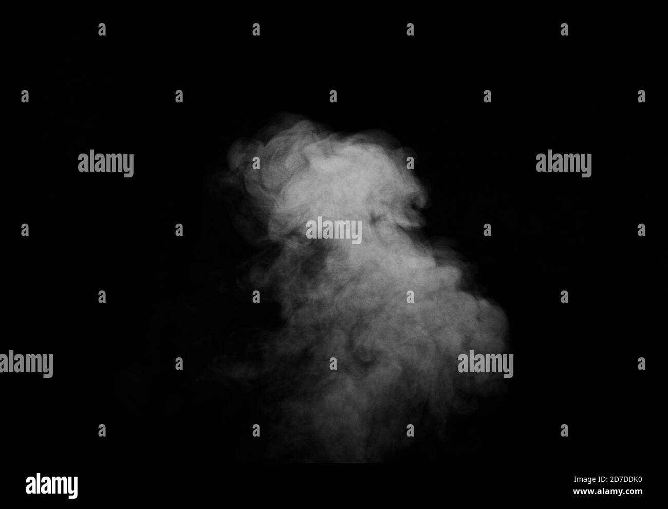 White smoke on black background. Figured smoke on a dark background. Abstract background, design element Stock Photo