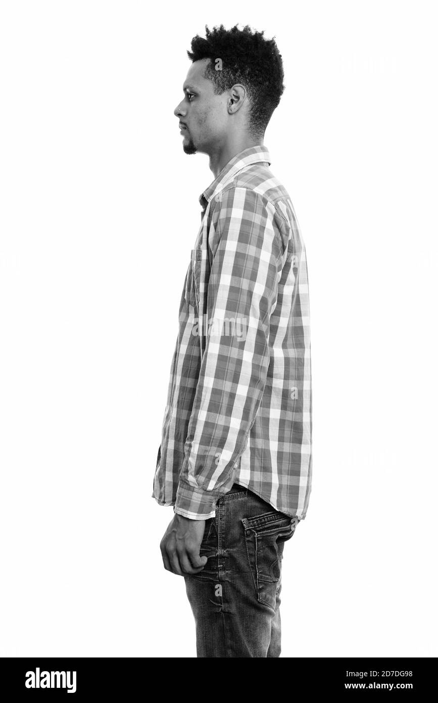 Man standing side view Black and White Stock Photos & Images - Alamy