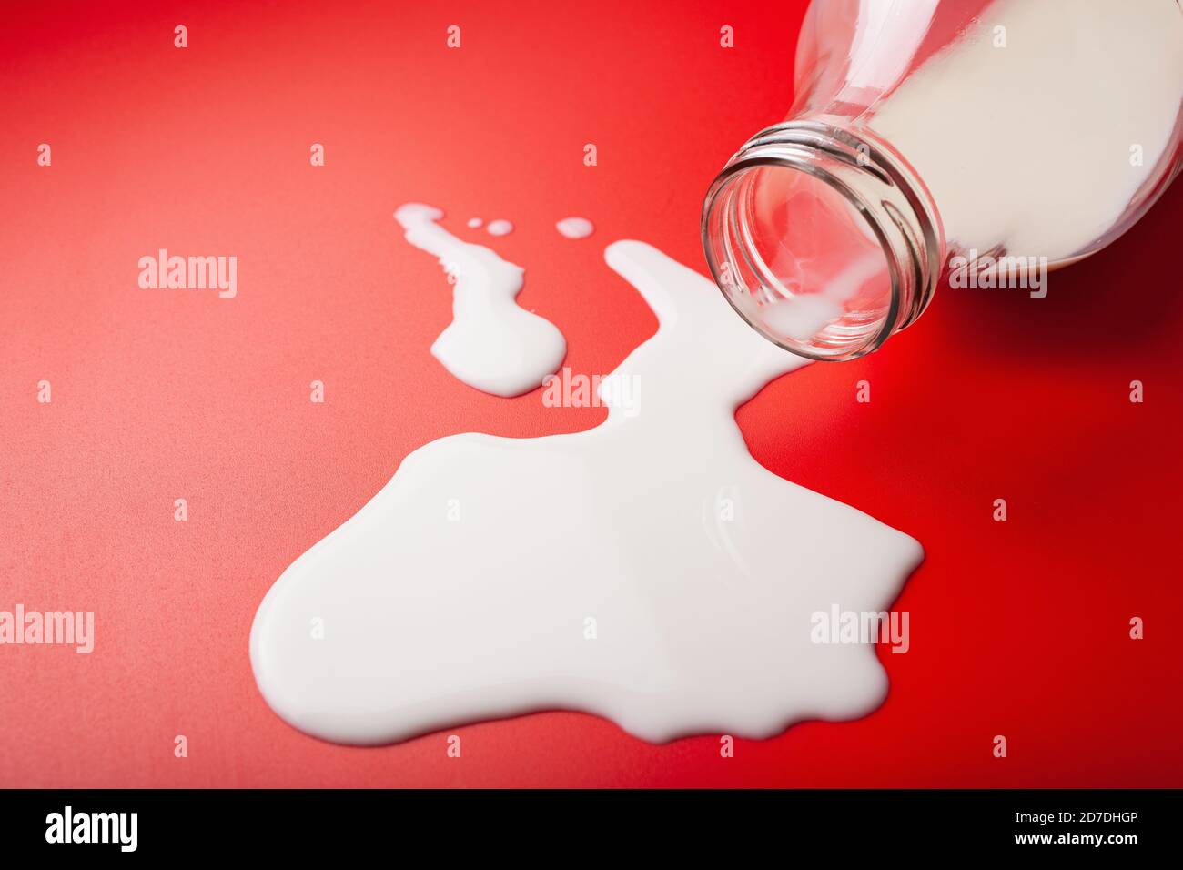 bad milk lactose intolerance allergy. milk bottle splatter. avoid