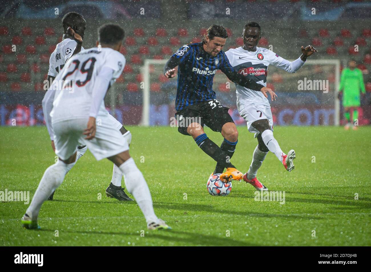 Herning, Denmark. 21st Oct, 2020. Hans Hateboer (33) of Atalanta and Pione  Sisto (7) of FC Midtjylland seen during the UEFA Champions League match  between FC Midtjylland and Atalanta in Group D