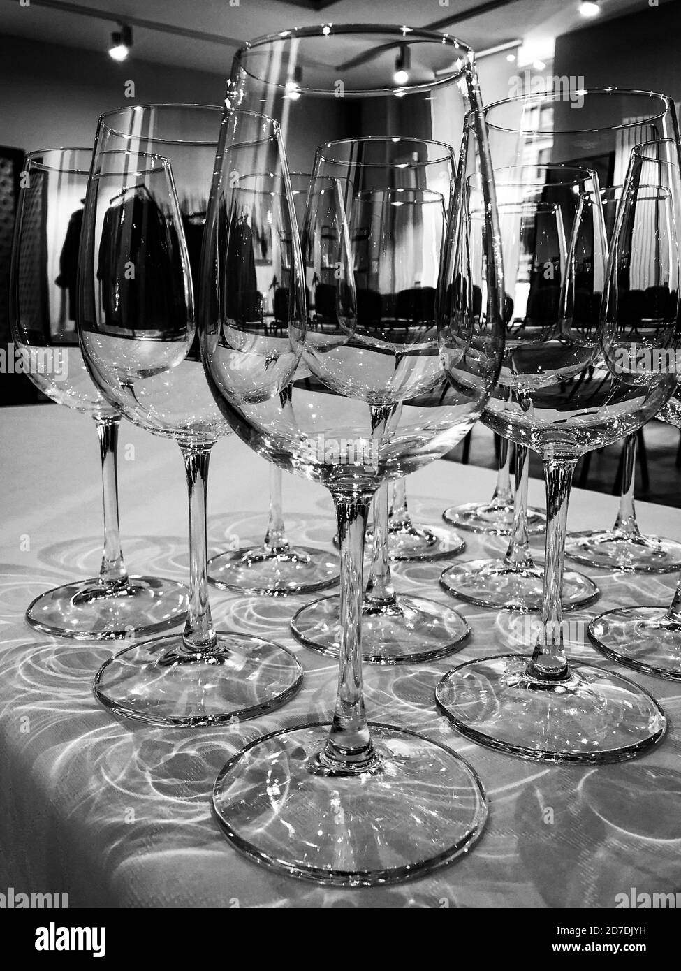 Empty clear and transparent glasses for welcome drink on the event. Stock Photo