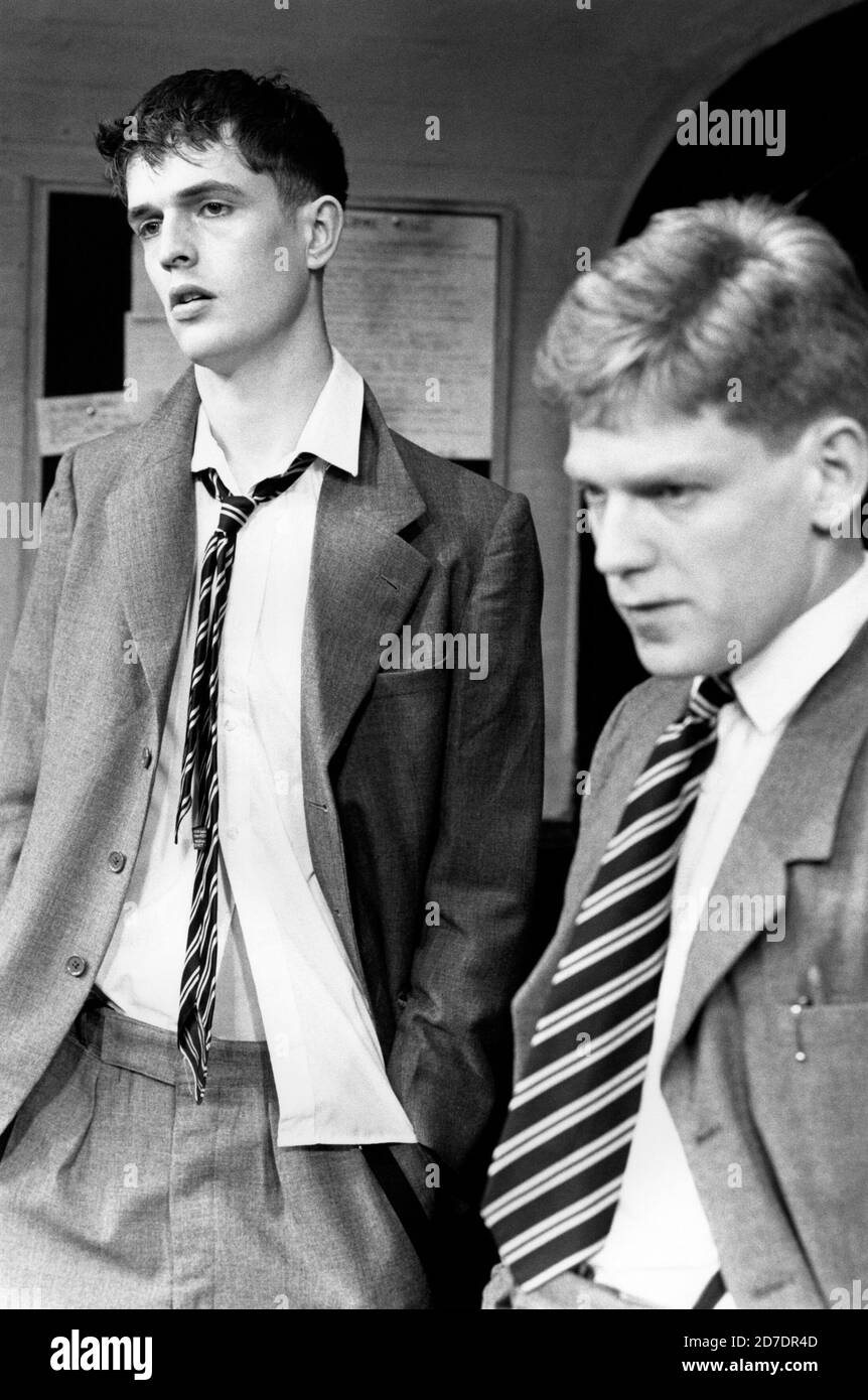 l-r: Rupert Everett (Guy Bennett), Kenneth Branagh (Tommy Judd) in ANOTHER COUNTRY by Julian Mitchell at the Queen's Theatre, London W1  02/03/1982  a Greenwich Theatre 1981 production  design: Bernard Culshaw  lighting: Leonard Tucker  director: Stuart Burge Stock Photo