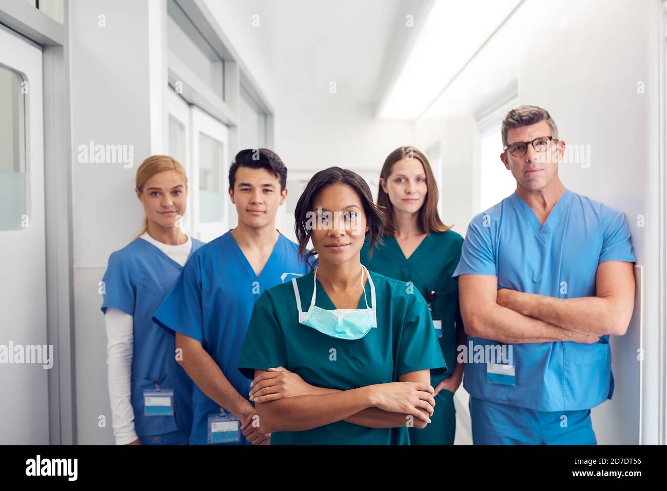 Portrait Of Multi-Cultural Medical Team Standing In Hospital Corridor ...