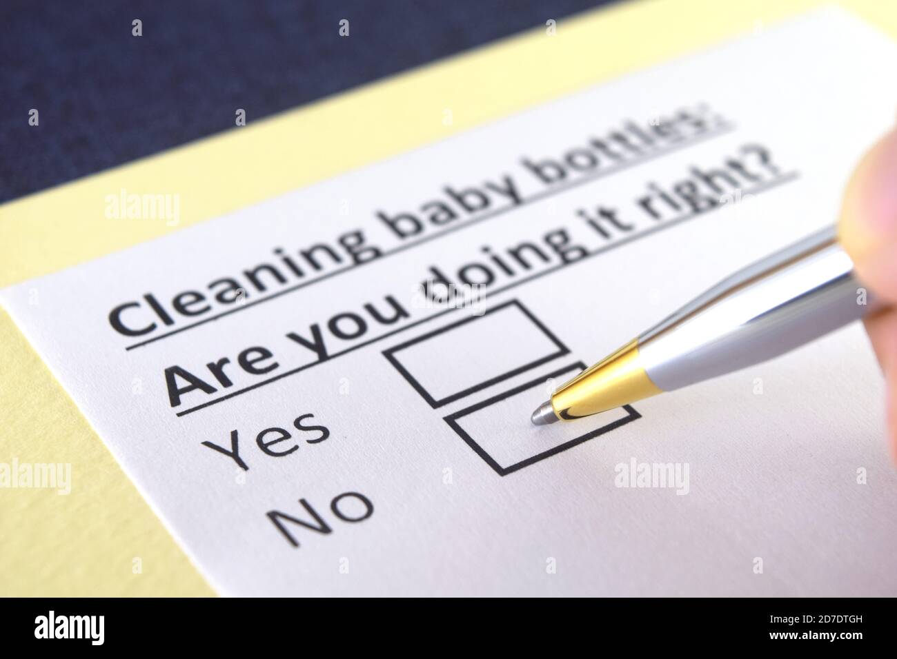 One person is answering question about cleaning baby bottles. Stock Photo