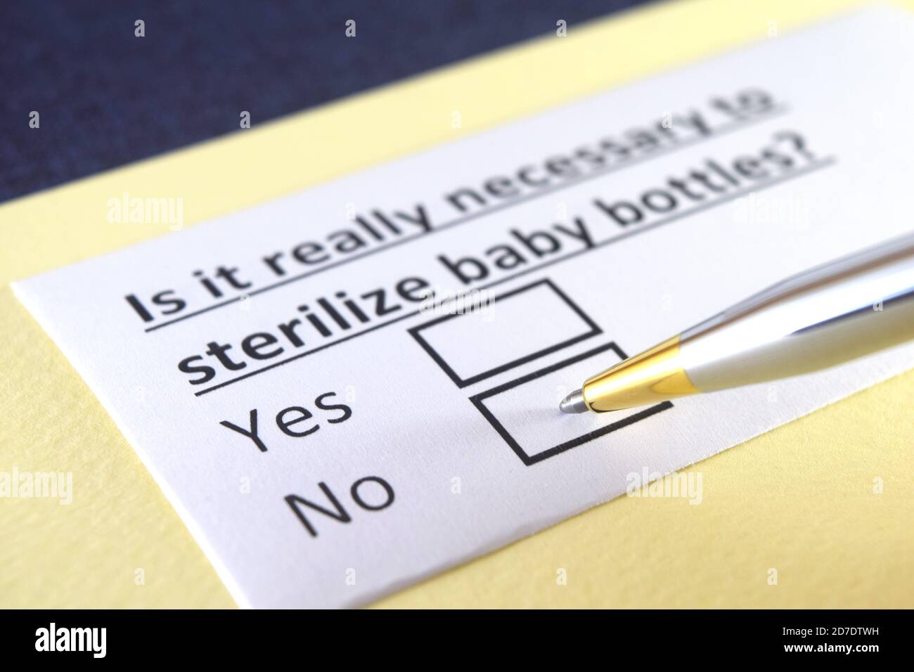 One person is answering question about baby bottles sterilization Stock