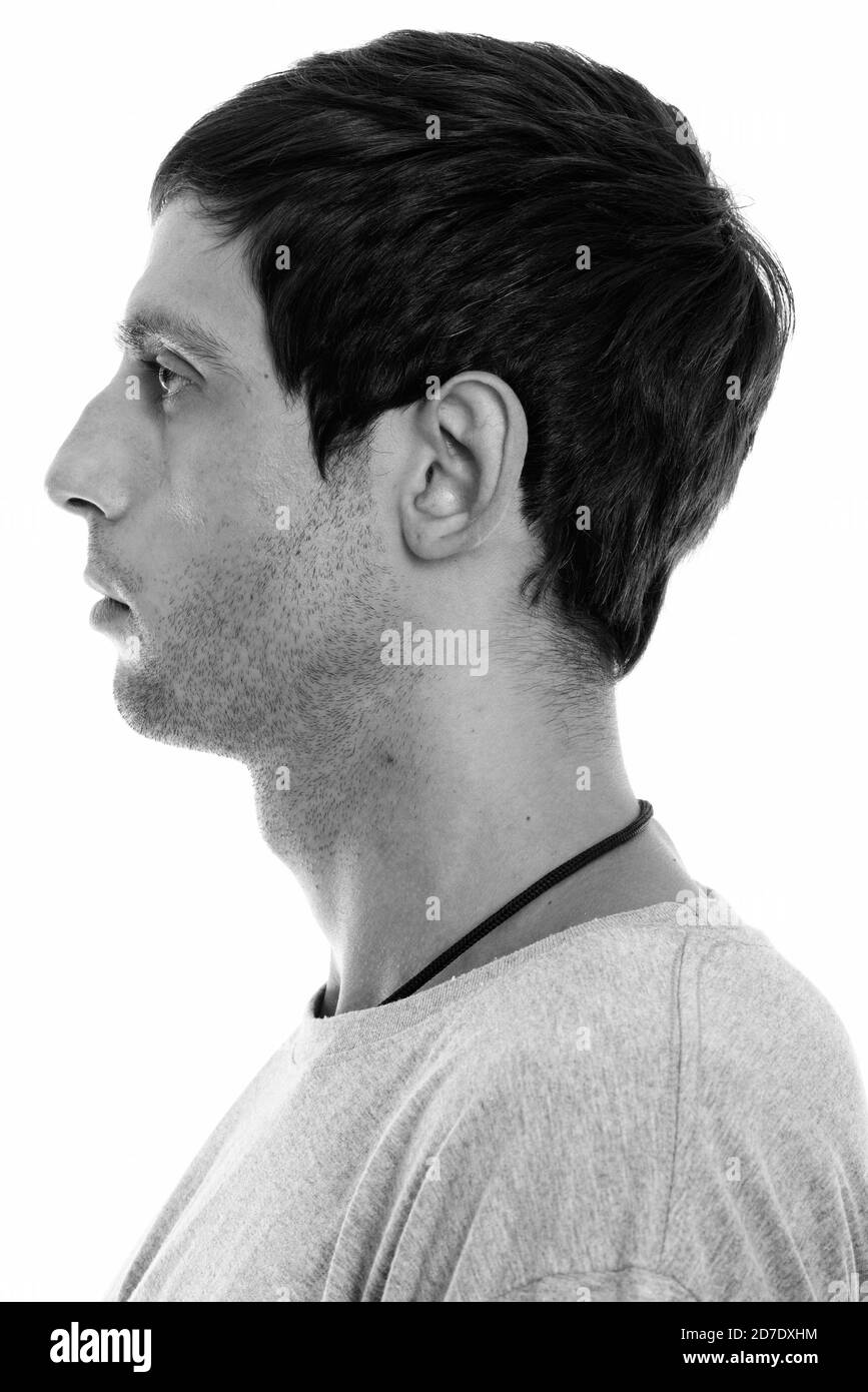 Profile view of face of young handsome man Stock Photo - Alamy