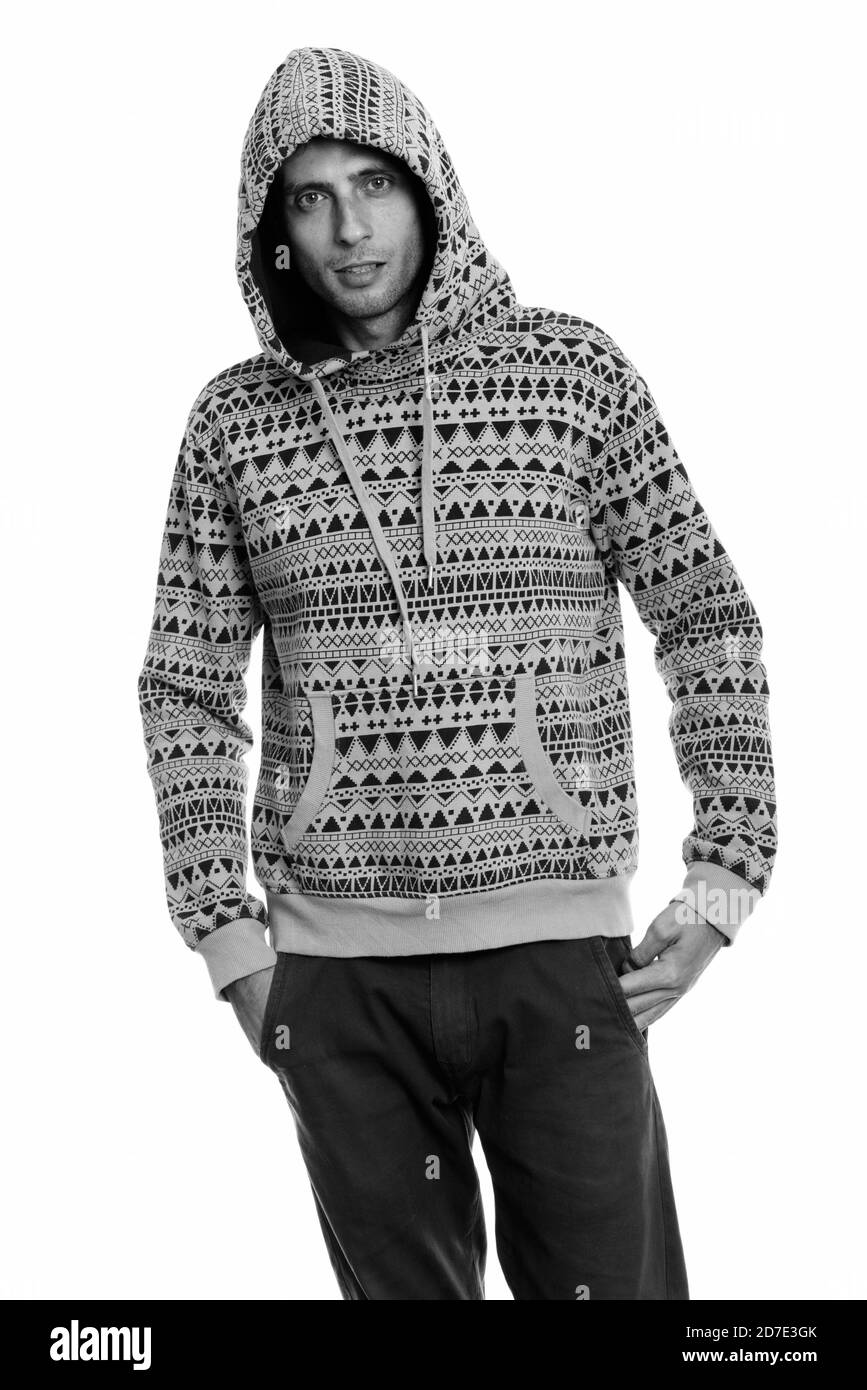 Hooded young man standing hi-res stock photography and images - Alamy