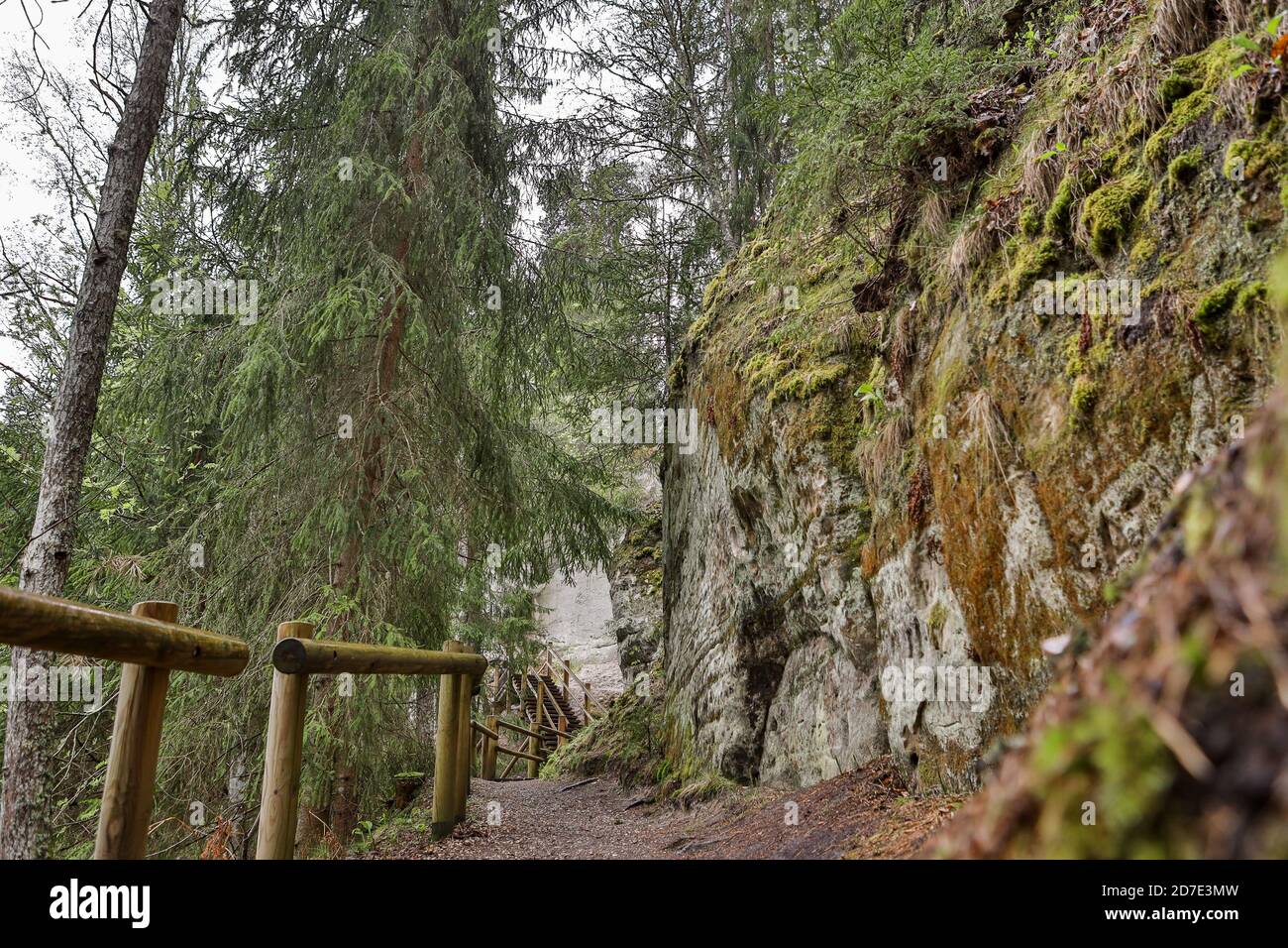 Turist track, path near large natural clifs in europe. Photo taken on a cloudy spring day. Stock Photo