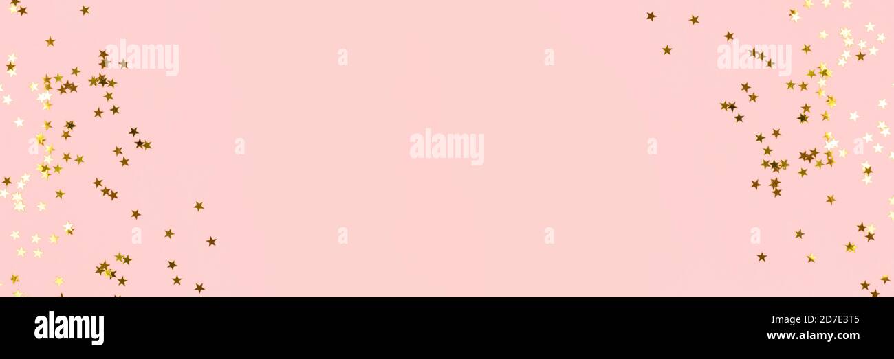 Gold stars confetti scattered on a pink pastel background. Festive ...