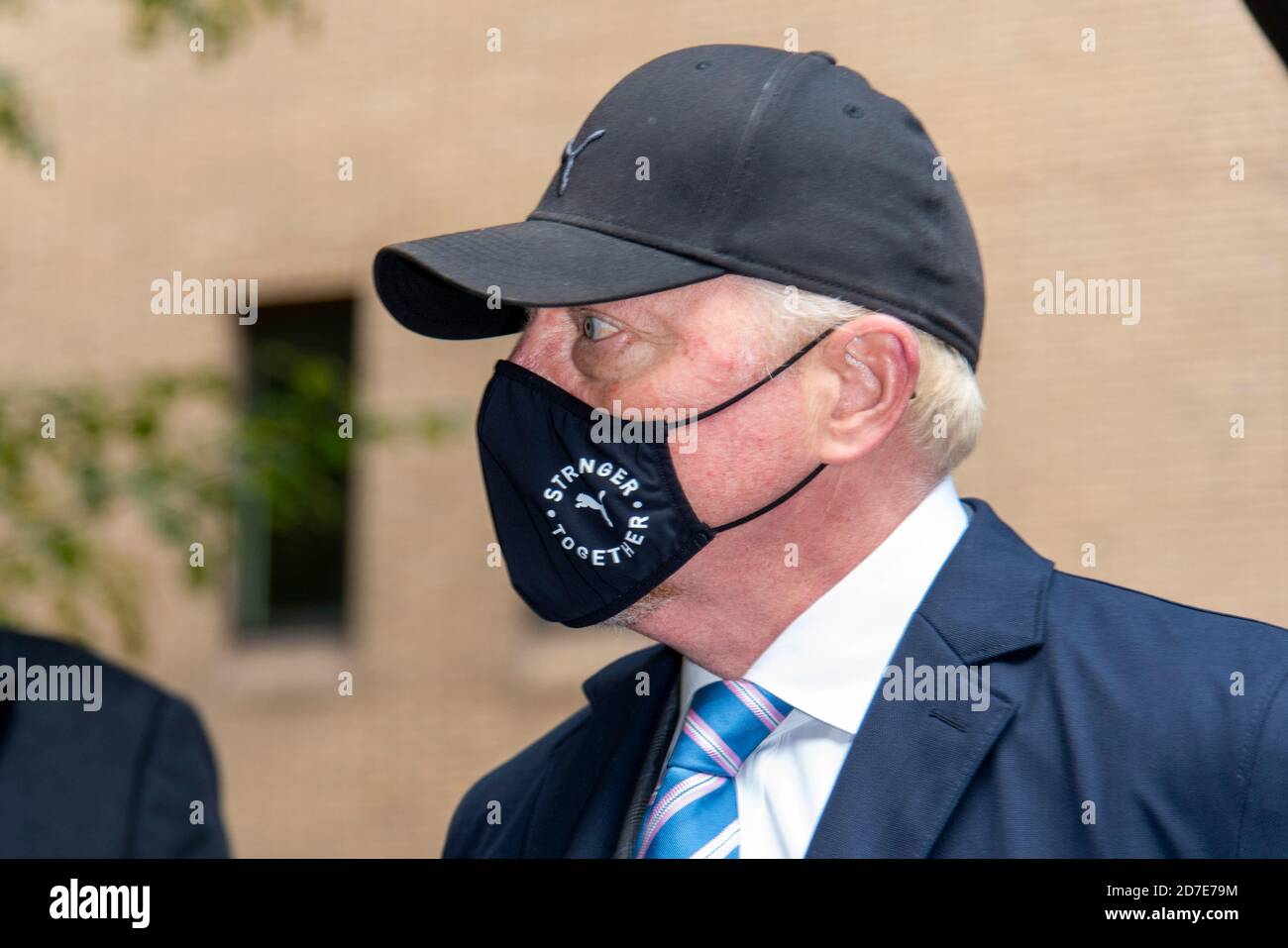 Former tennis professional Boris Becker (52), wearing a facemask leaves Southwark Crown Court after a Plea and Trial Preparation where he faces charges of failure to comply with a legal obligation to disclose financial information when filing for bankruptcy in 2017 including a number of properties and bank accounts. Stock Photo