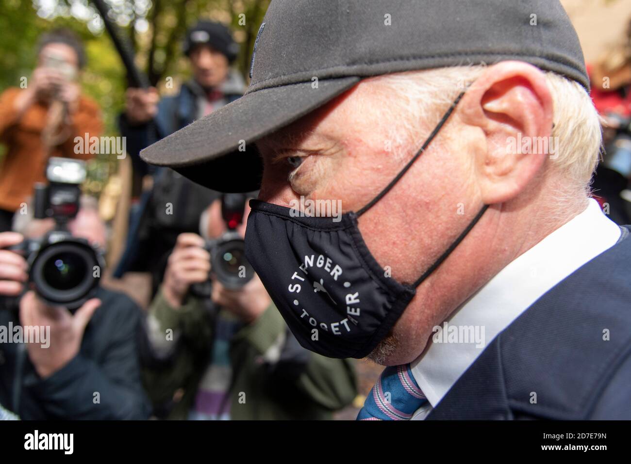 Former tennis professional Boris Becker (52), wearing a facemask leaves Southwark Crown Court after a Plea and Trial Preparation where he faces charges of failure to comply with a legal obligation to disclose financial information when filing for bankruptcy in 2017 including a number of properties and bank accounts. Stock Photo