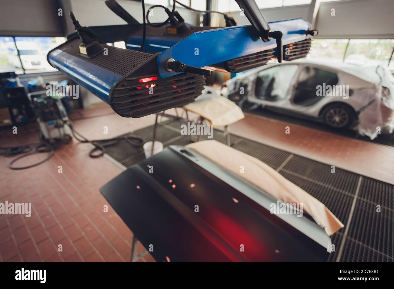 Infrared drying of car body parts after applying putty and paint