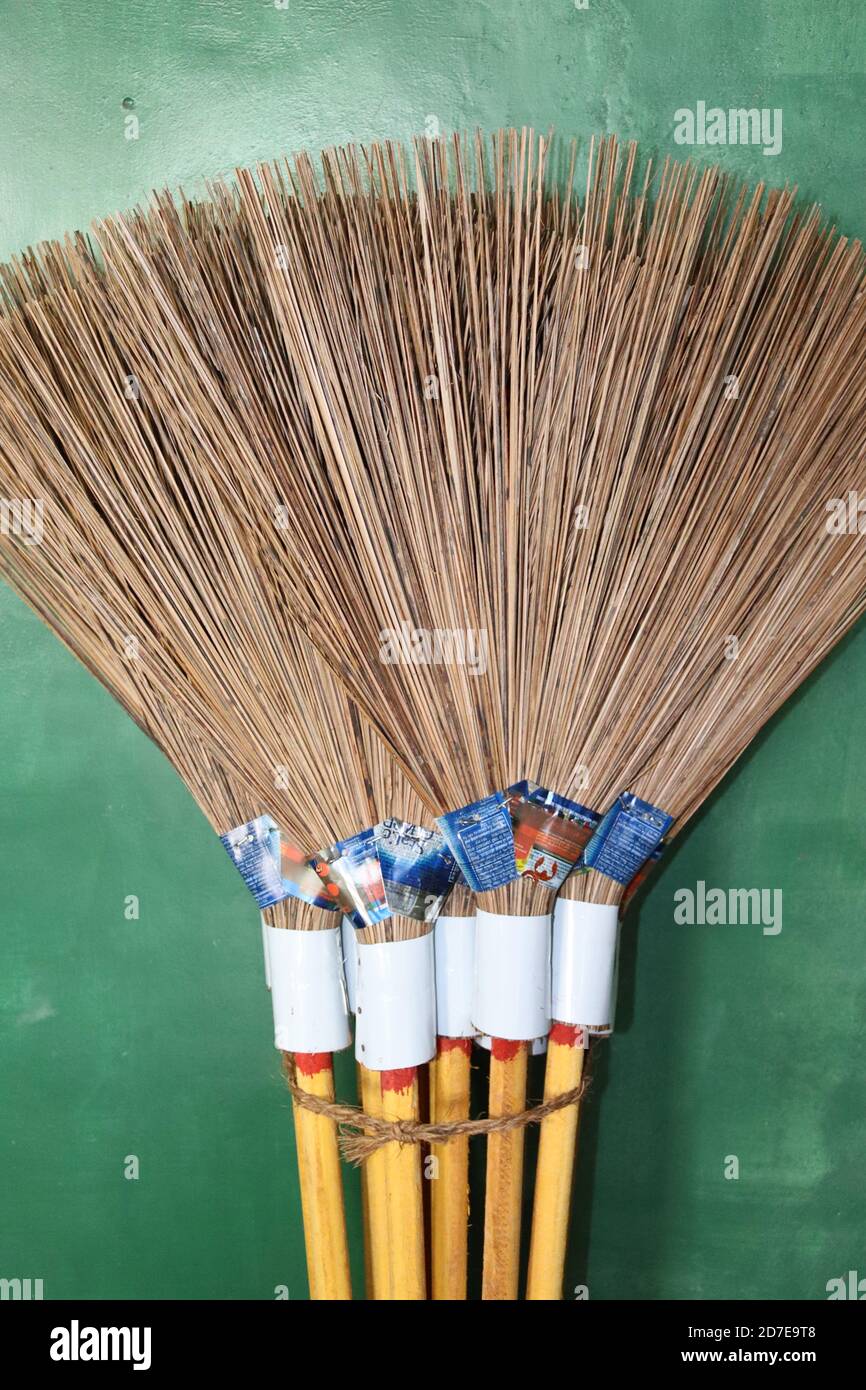 A bundle of handmade brooms, made by coconut sticks. Most famous outdoor  cleaning broom in Sri Lanka. This is one destination of coconut tree parts  Stock Photo - Alamy